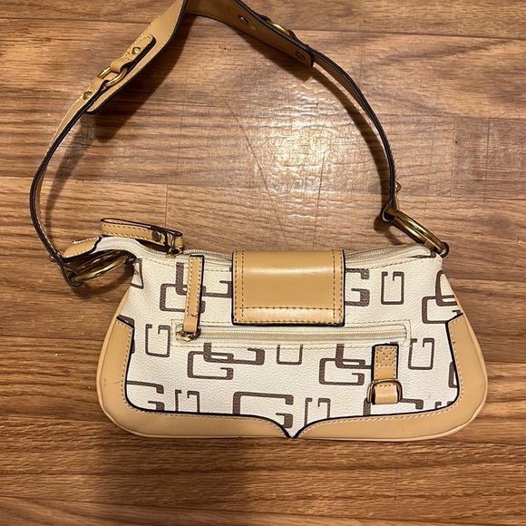 Guess cream with tan and gold accents shoulder bag. (5”x10.5”) - Picture 3 of 5